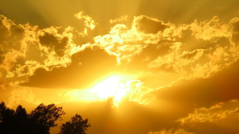 Golden sunlight breaking through clouds