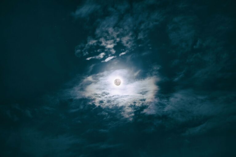 Dramatic full moon against a dark sky